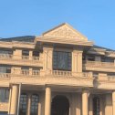 岳阳黄金麻别墅外墙干挂石材效果示例