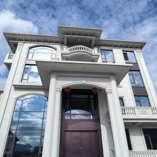 岳阳白麻别墅外墙干挂石材效果示例