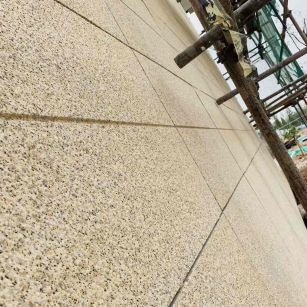 岳阳 黄金麻花岗岩荔枝面外墙干挂石材效果示例