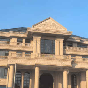 岳阳黄金麻别墅外墙干挂石材效果示例