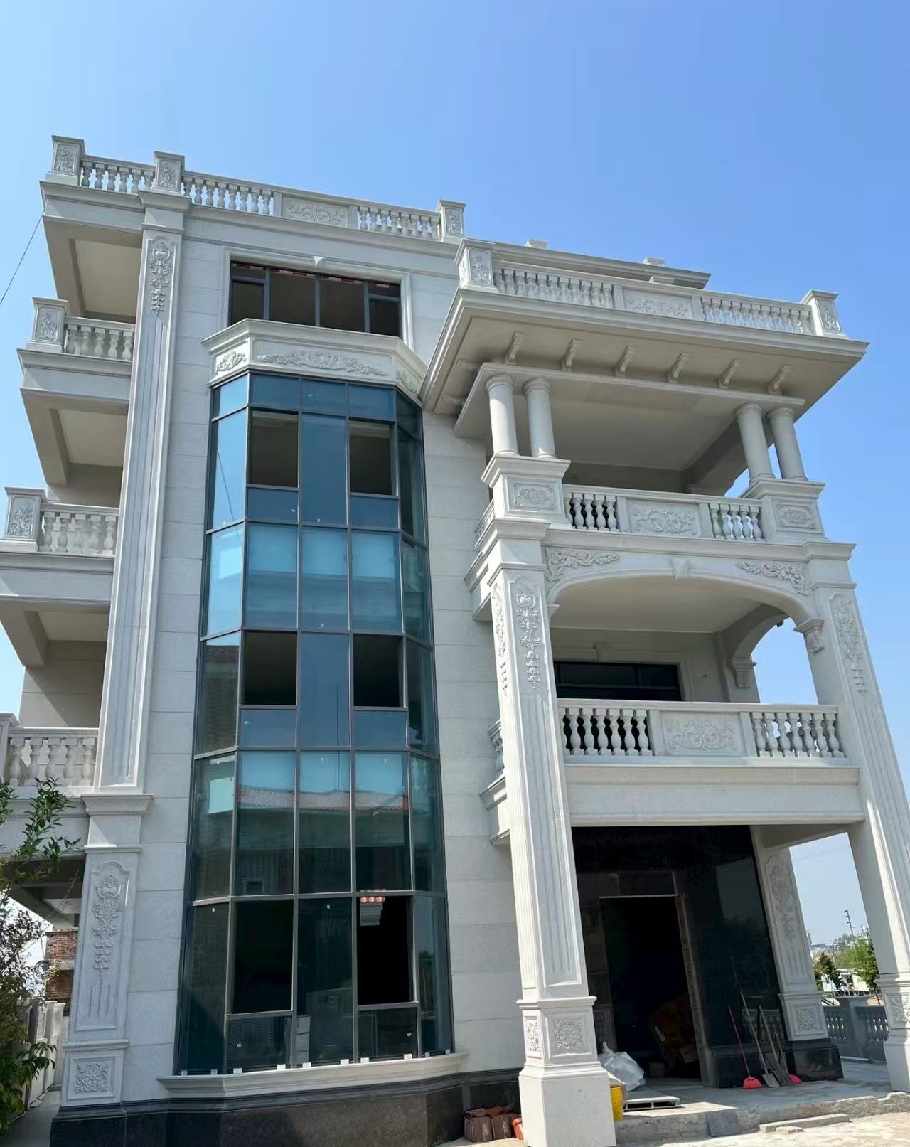 岳阳 白麻花岗岩别墅外墙干挂效果展示