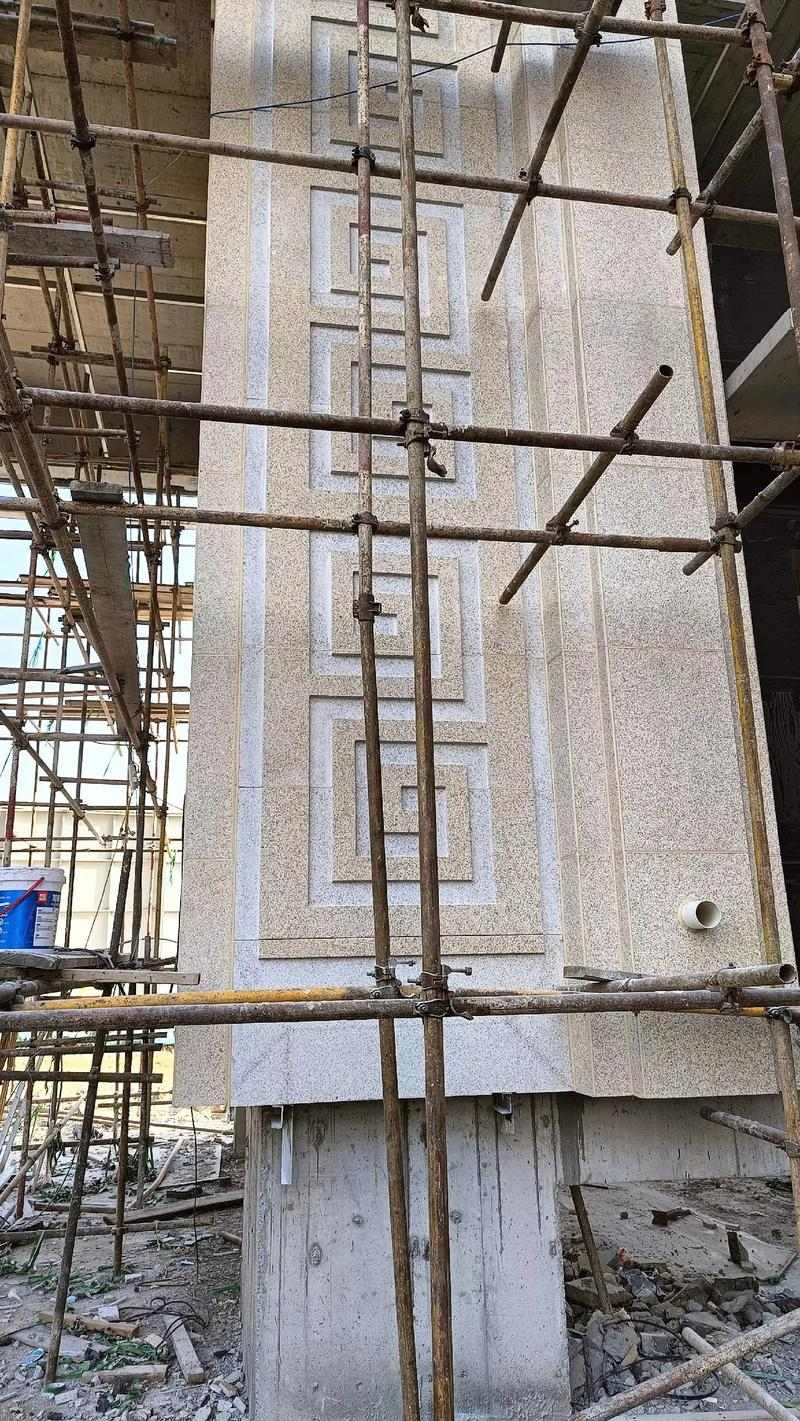 岳阳 黄金麻花岗岩别墅外墙干挂回纹造型效果