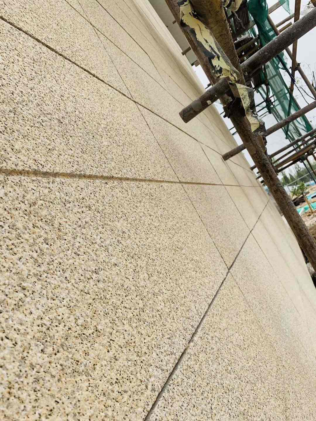 岳阳 黄金麻花岗岩荔枝面外墙干挂石材效果示例